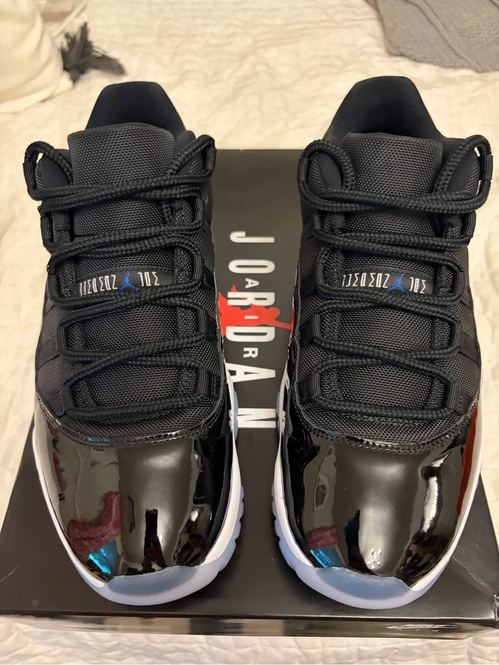 Air Jordan 11 retro low: black/white/varsity royal